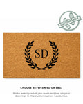 Doormat with monogram 'SD' design on a white background [VARIANT: TWO INITIALS / NO BORDER]