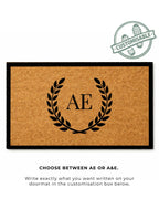 Doormat withAE monogram design on a white background [VARIANT: TWO INITIALS / BORDER]