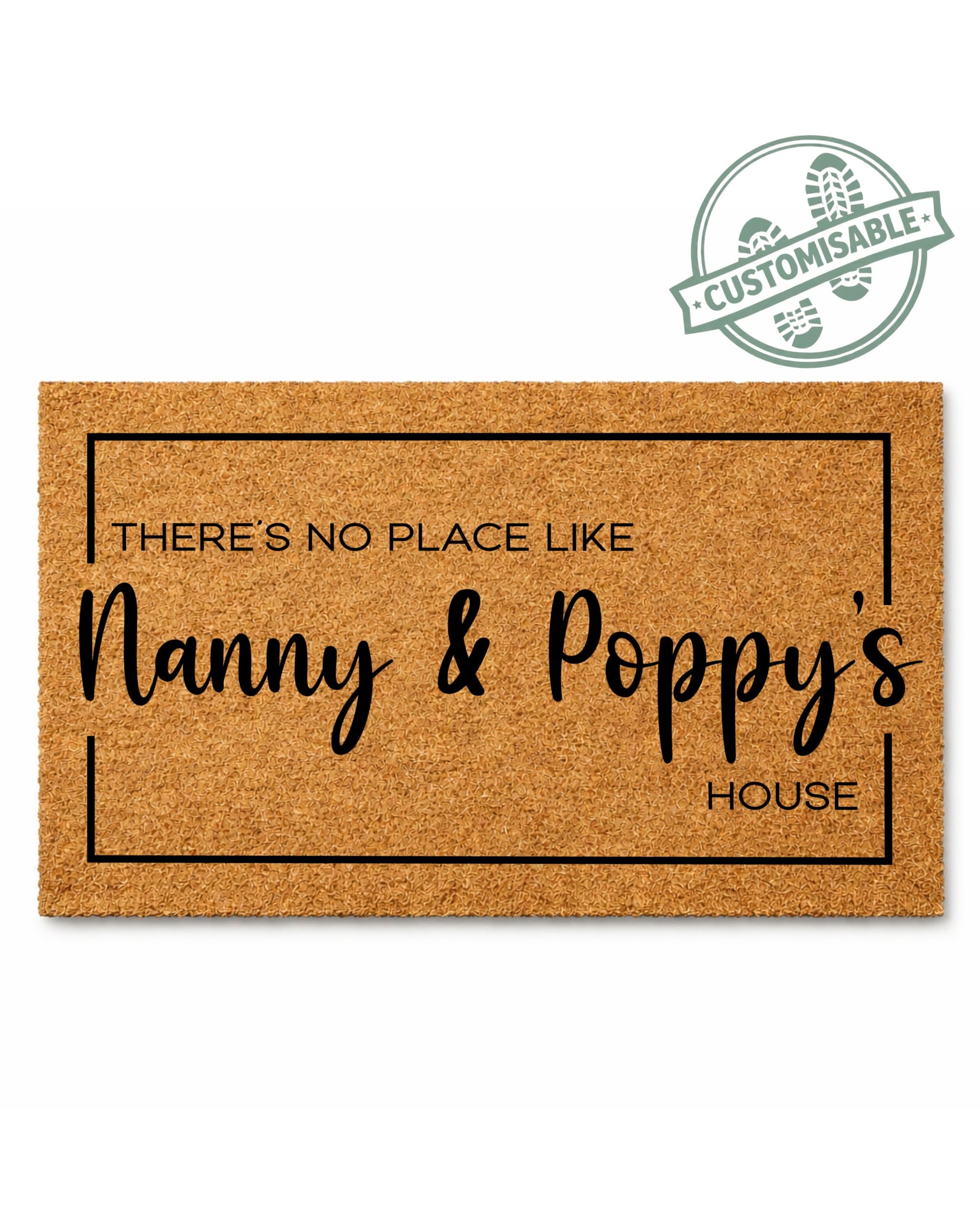 Doormat with text 'THERE'S NO PLACE LIKE Nanny & Poppy's HOUSE' on a white background