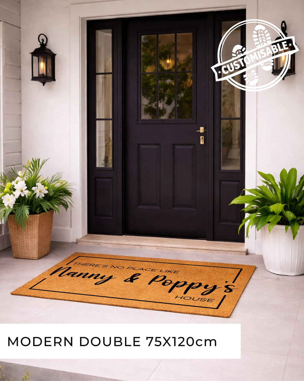 Front door with a doormat and plants on a light-colored floor.