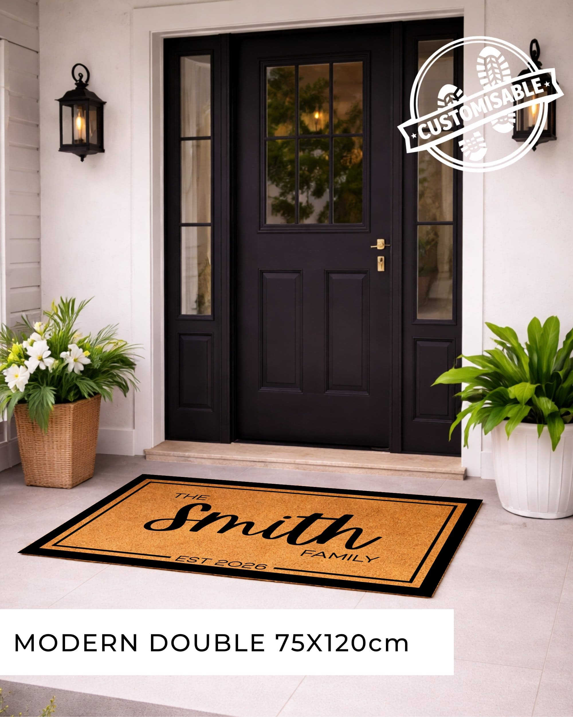 Front door with a personalized doormat and decorative plants. [VARIANT: BORDER-EST]