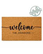Doormat with 'welcome THE JOHNSONs' text on a white background [VARIANT: STANDARD]
