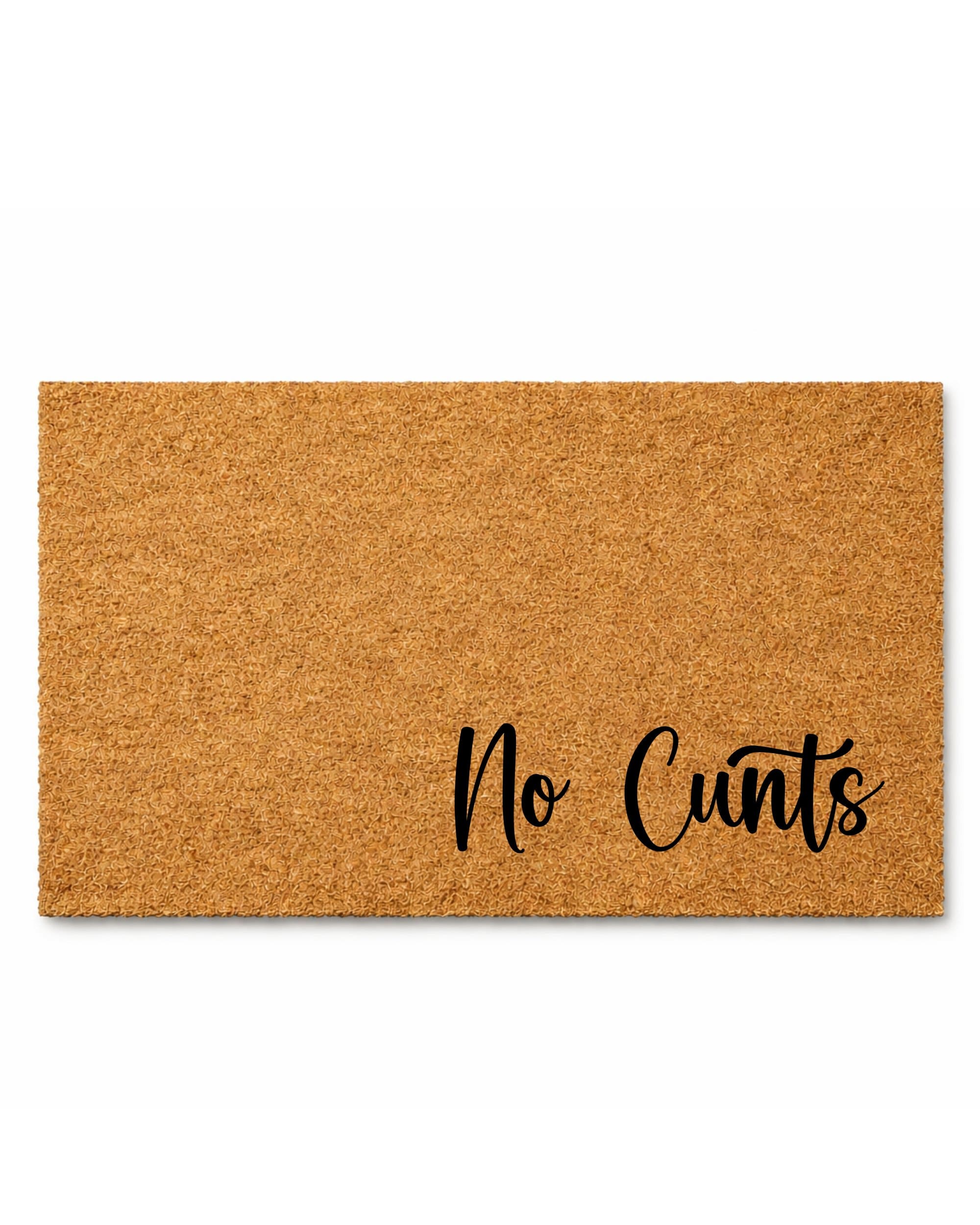 Doormat with 'No Cunts' text on a white background [variant: fancy]