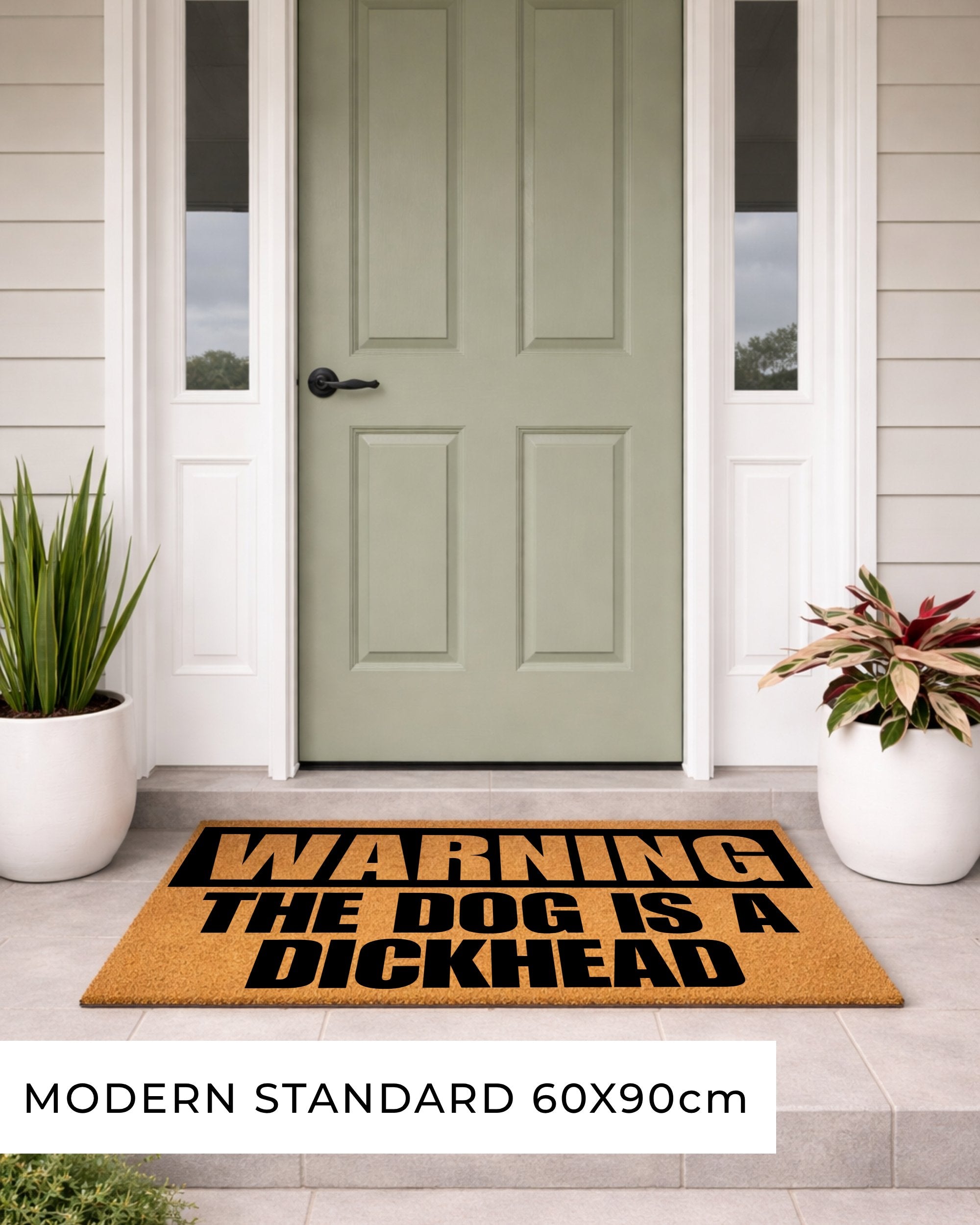 Doormat with humorous text on a front door of a house [variant: dog-dickhead]