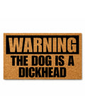 Doormat with humorous text 'WARNING THE DOG IS A DICKHEAD' on a white background [variant: dog-dickhead]