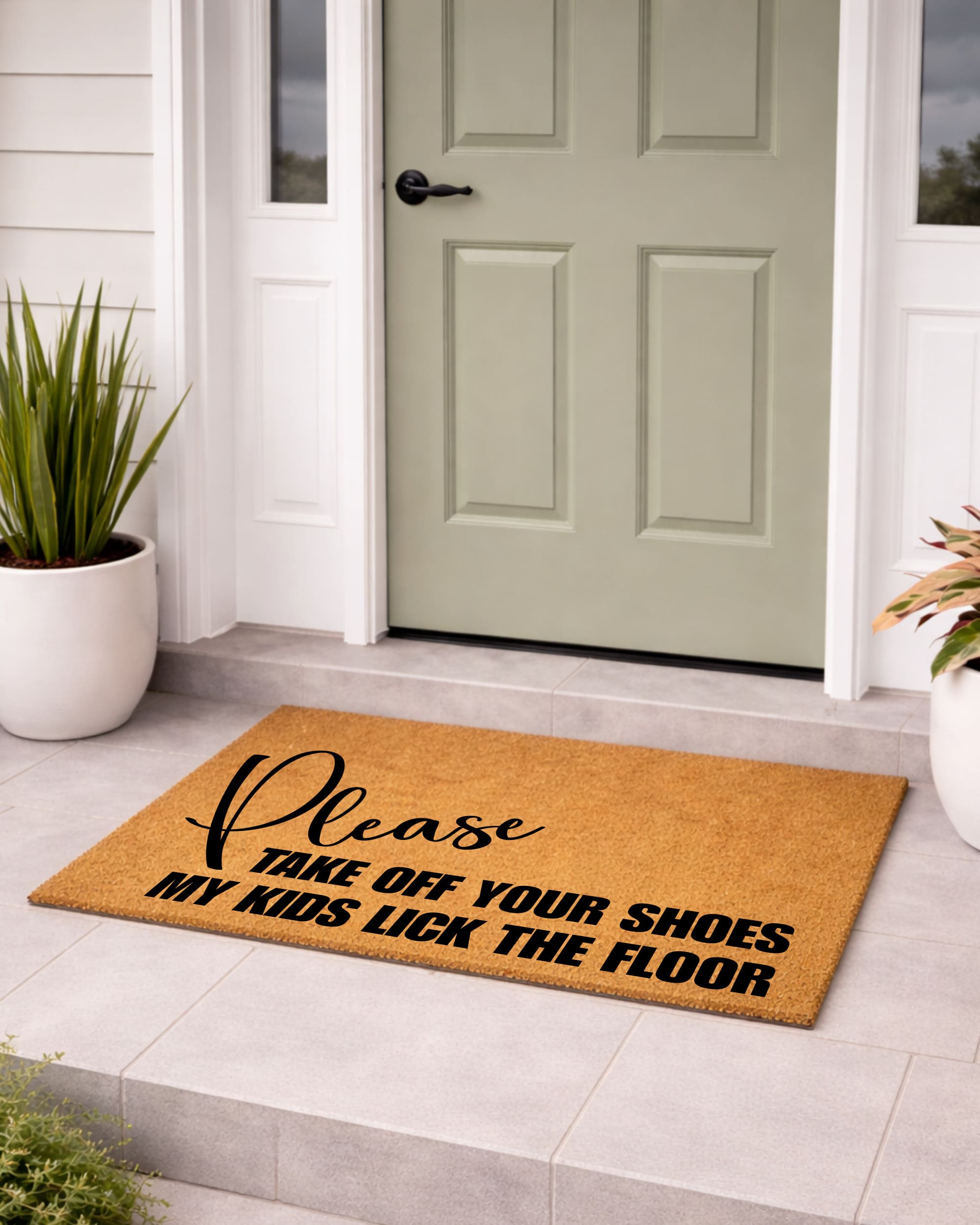 Doormat with Please take off your shoes my kids lick the floor on a tiled floor in front of a door.