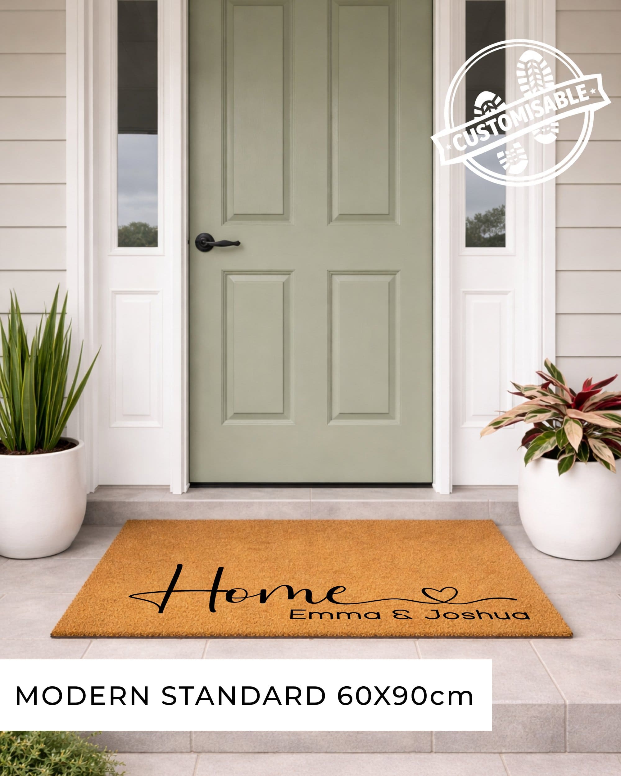 Doormat with 'Home Emma & Joshua' text in front of a green door on a house exterior.