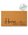 Doormat with 'Home Emma & Joshua' text on a white background